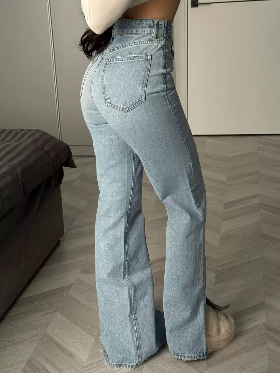 High-Waisted Wide-Leg Jeans With Crossover Waist Detail – Light Blue
